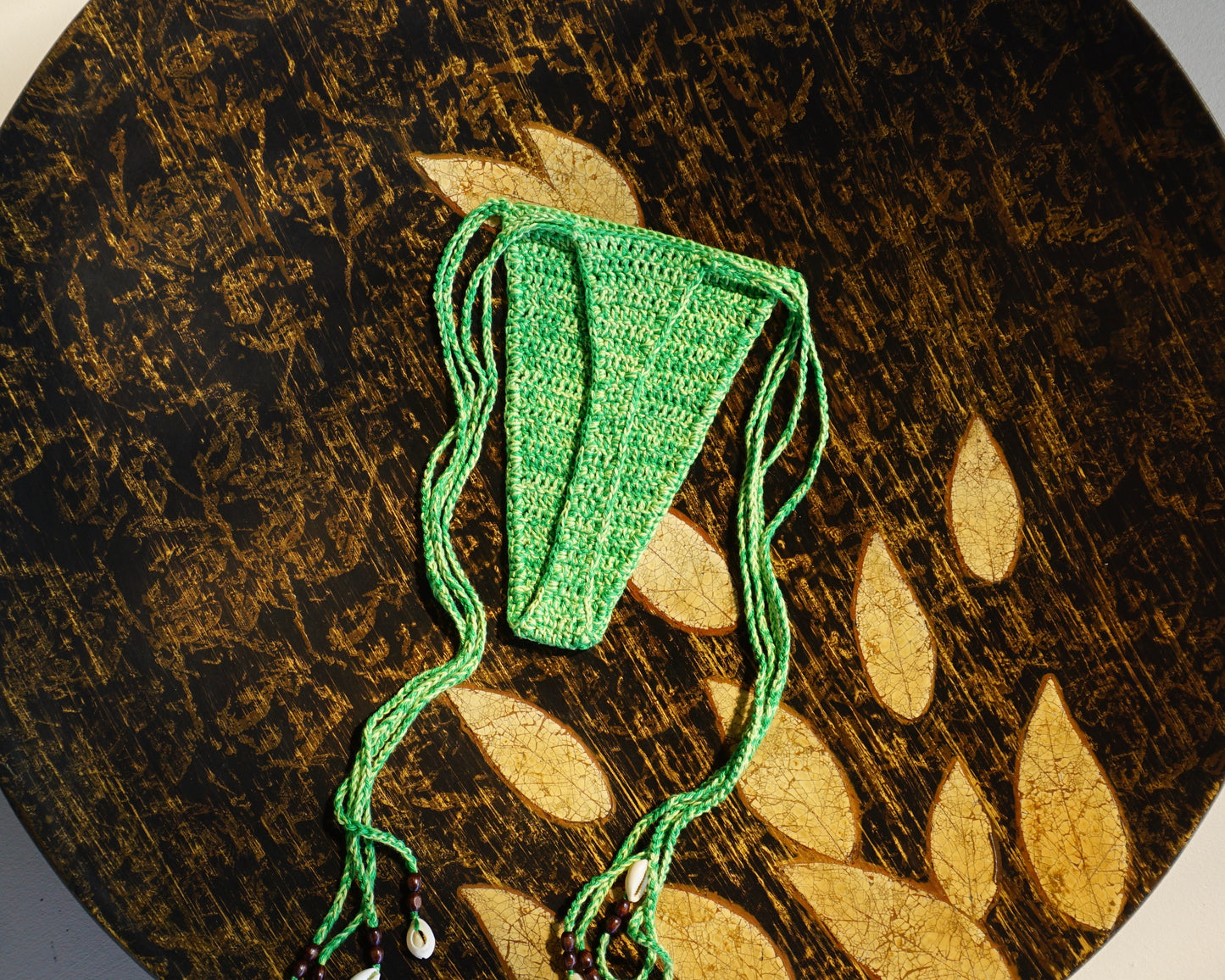 green tie front brazilian crochet bikini set with shells for swimming flatlay bottoms